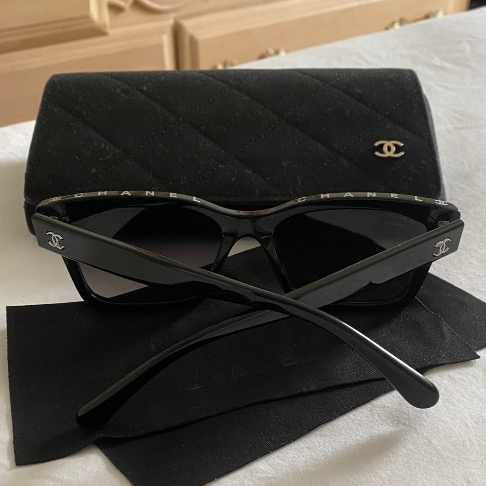 CHANEL Elegant Black Sunglasses with Quilted Case